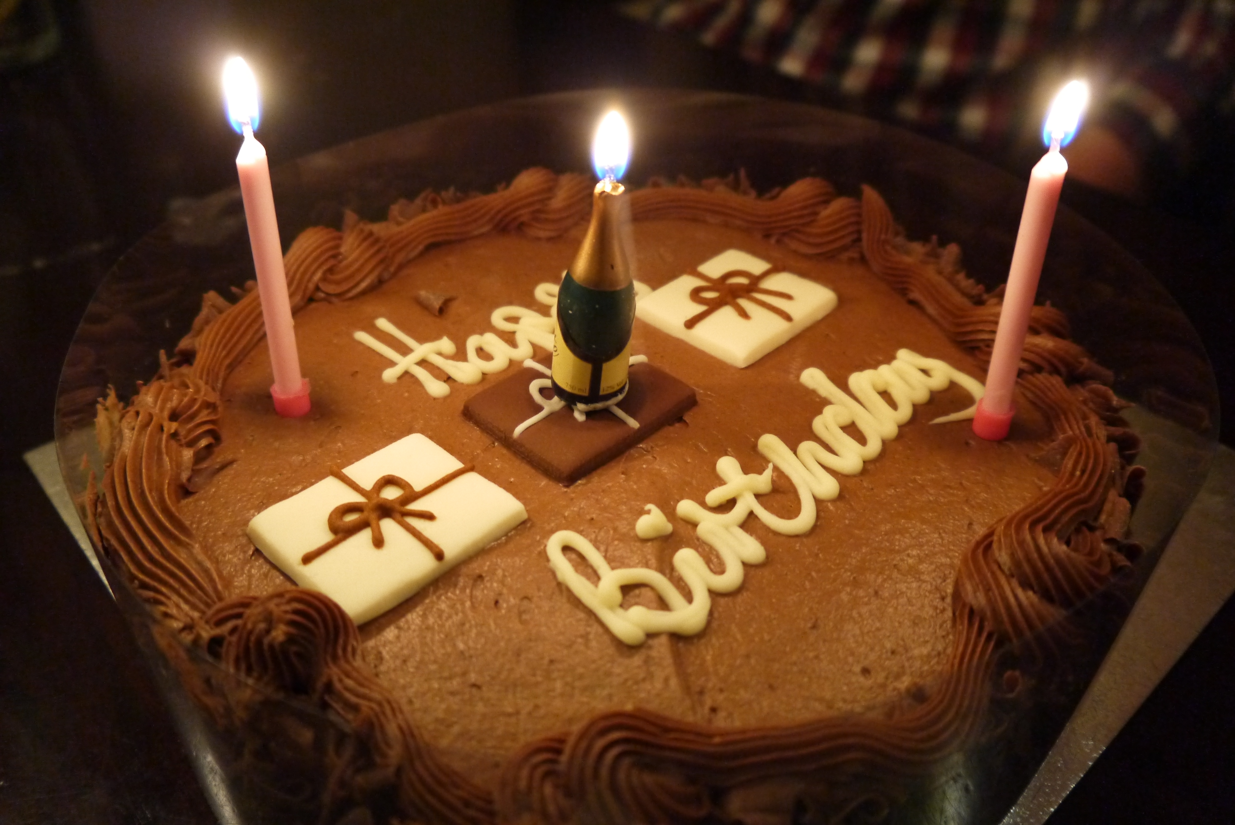 http://pcwallart.com/happy-birthday-chocolate-cake-with-candles-wallpaper-3.html